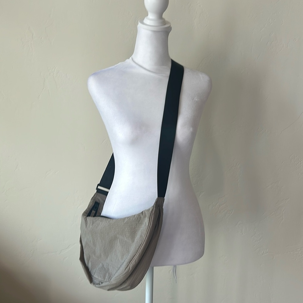 H & M Crossbody Bag with Adjustable Strap. Khaki bag with Black Strap.Never used